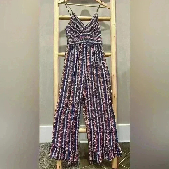 Jessica Simpson Romper size small floral blue with ruffle hem - Picture 1 of 8